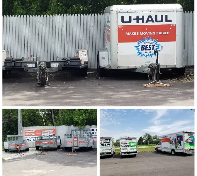 U-Haul trucks and tow-behind trailers parked at Hwy 50 Storage lot